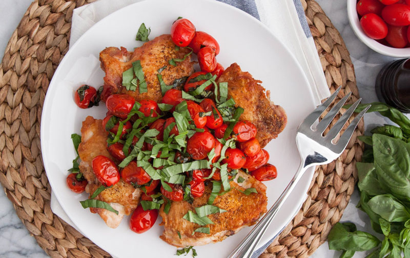 Chicken Thighs with Blistered Tomatoes and Basil