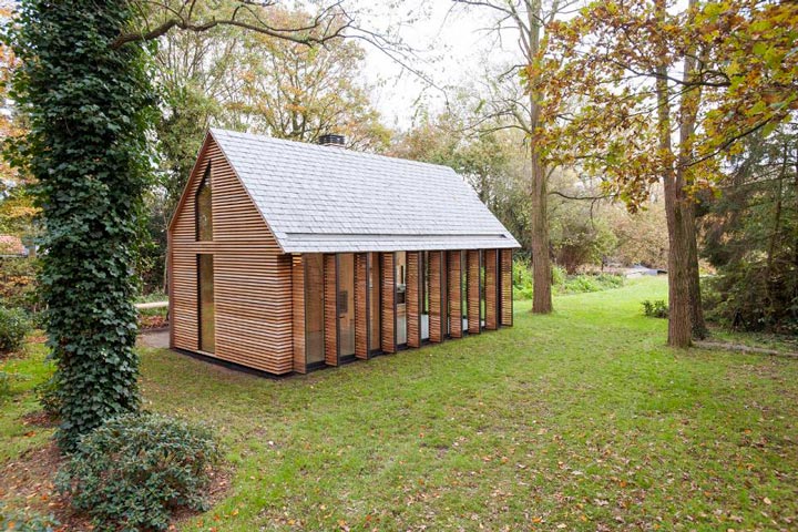 Picture Perfect Glass Cottage With A Wall Of Moving Shutters